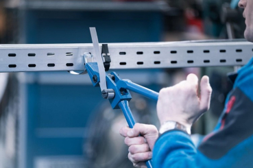 Preview: Kunststoffummanteltes Stahlspannband – Rolle 16,5 x 1,30 mm, 25 m, grau, feuerverzinkt